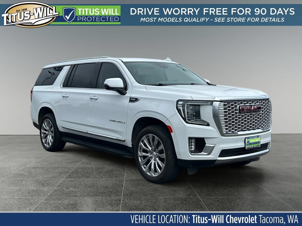 2024 GMC Yukon XL Denali in Summit White — front three-quarter view