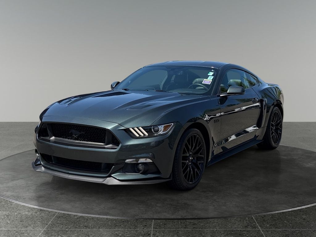 2015 Ford Mustang — rear three-quarter view