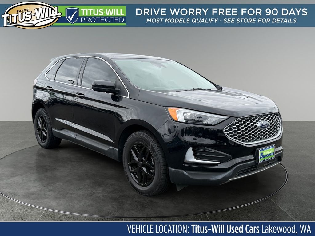 2024 Ford Edge SEL in Black Metallic — front three-quarter view