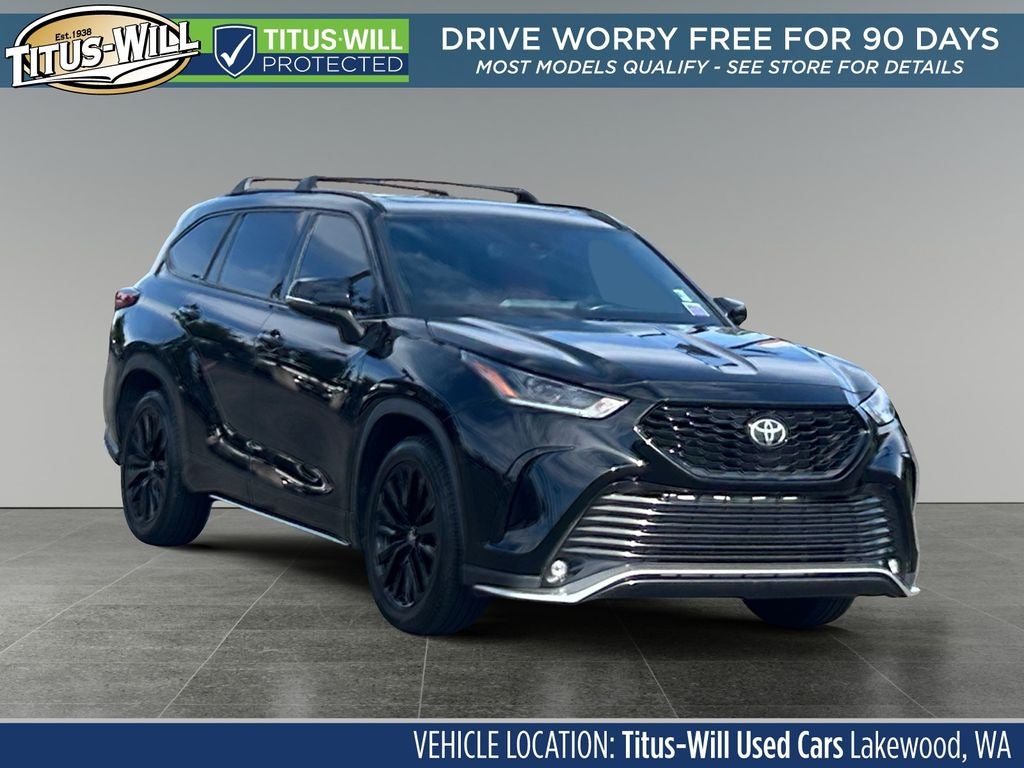 2023 Toyota Highlander XSE in Midnight Black Metallic — front three-quarter view
