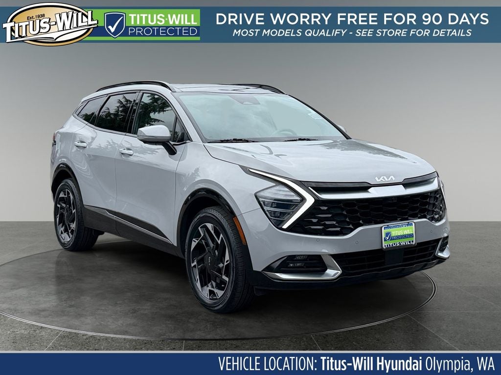 2024 Kia Sportage SX-Prestige in Wolf Gray — front three-quarter view