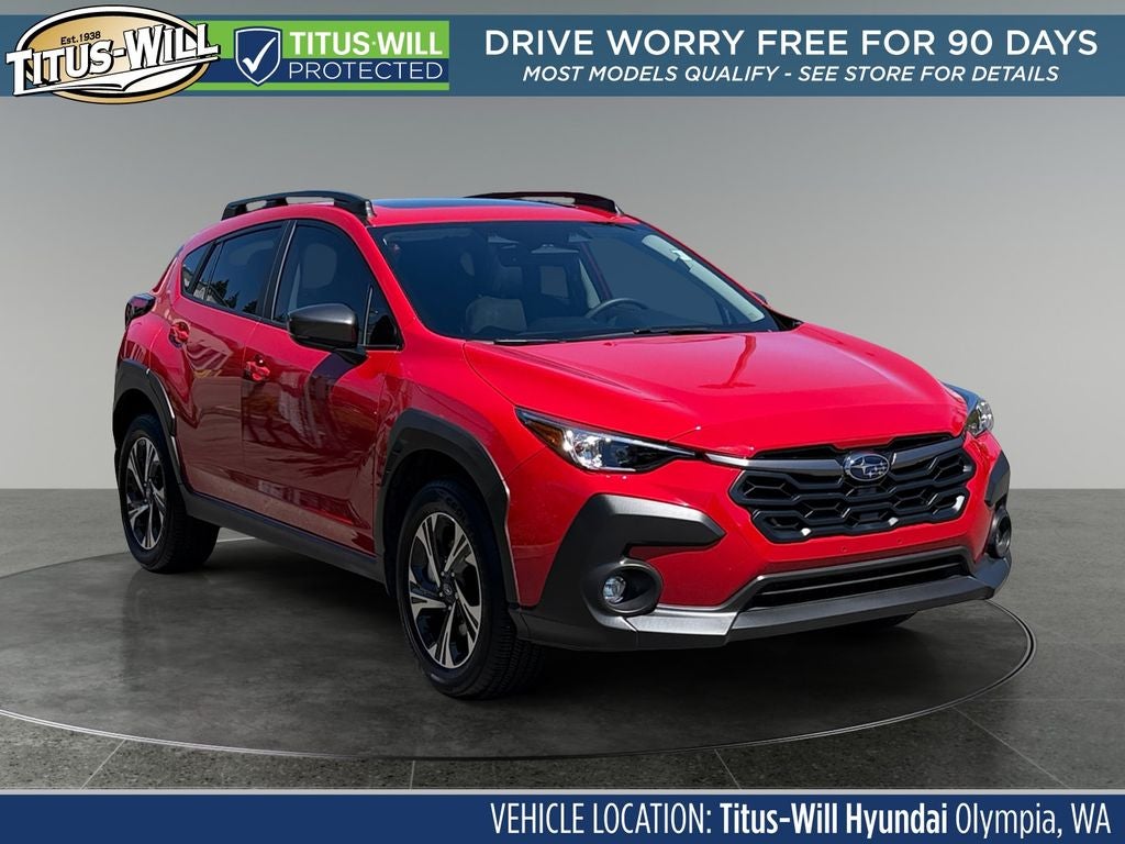 2024 Subaru Crosstrek Premium in Pure Red — front three-quarter view