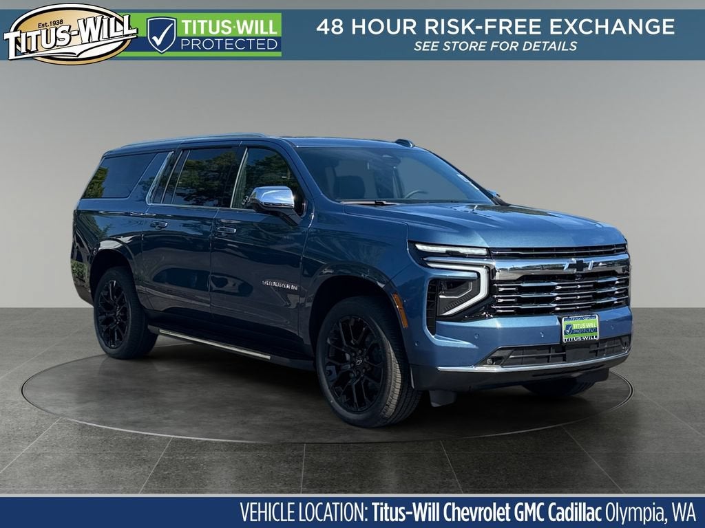2026 Chevrolet Suburban Premier in Lakeshore Blue Metallic — front three-quarter view