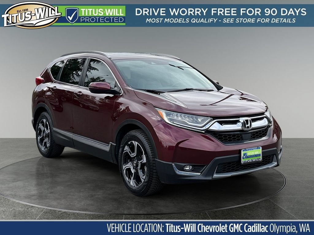 2018 Honda CR-V Touring in Red — front three-quarter view
